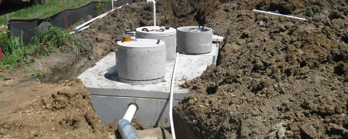 Septic system repair and installation site with tank access ports in Brandon, FL