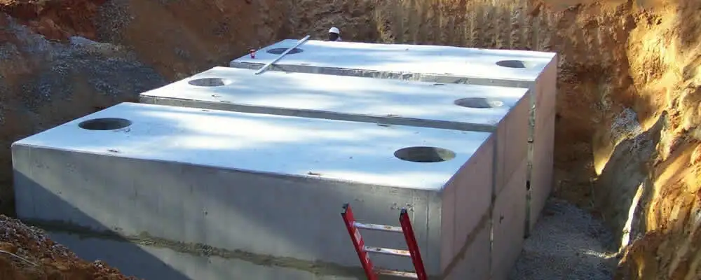 Septic tank installation site with a newly placed concrete tank in Brandon, FL
